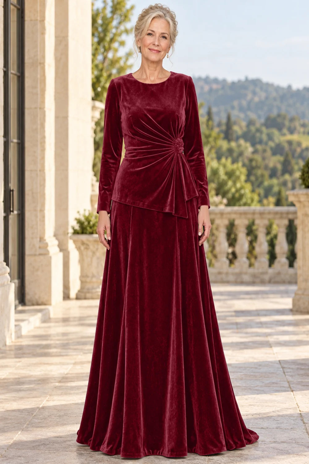 Front view of a burgundy dress with a ruched front and side rosette.