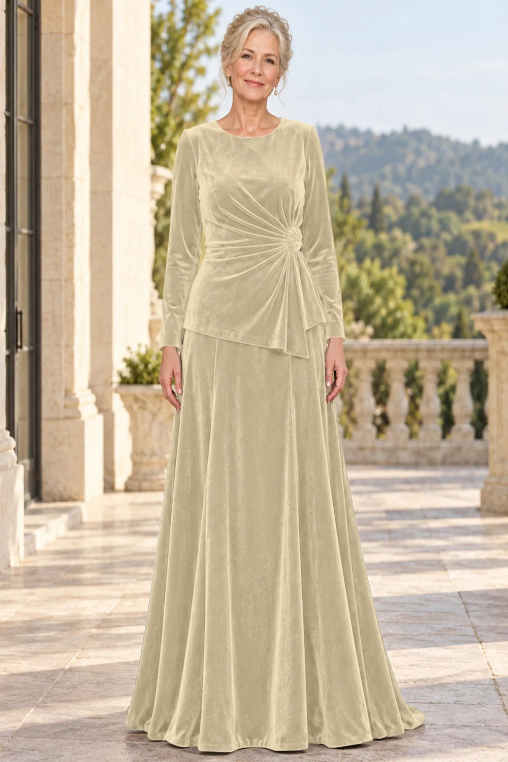 Front view of a champagne dress with a ruched front and side rosette.