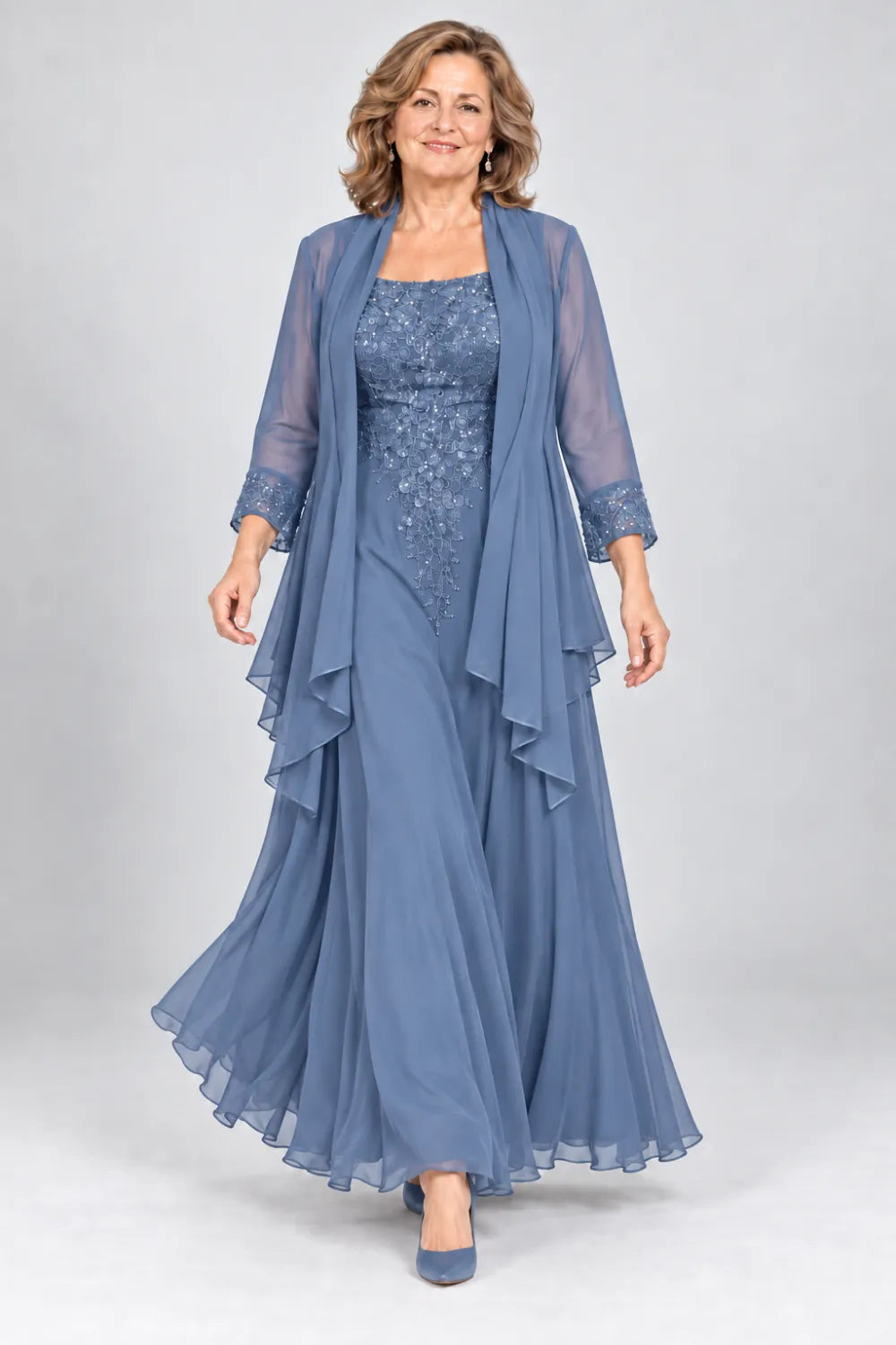 Dusty Blue dress with floral bodice and matching decorated cuffs, front view.
