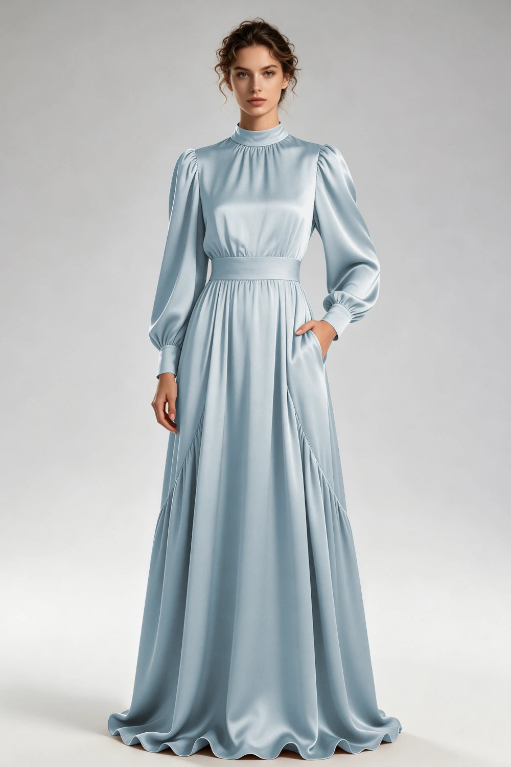 Front view of the dusty blue high-neck gown with bishop sleeves and a wide waistband.