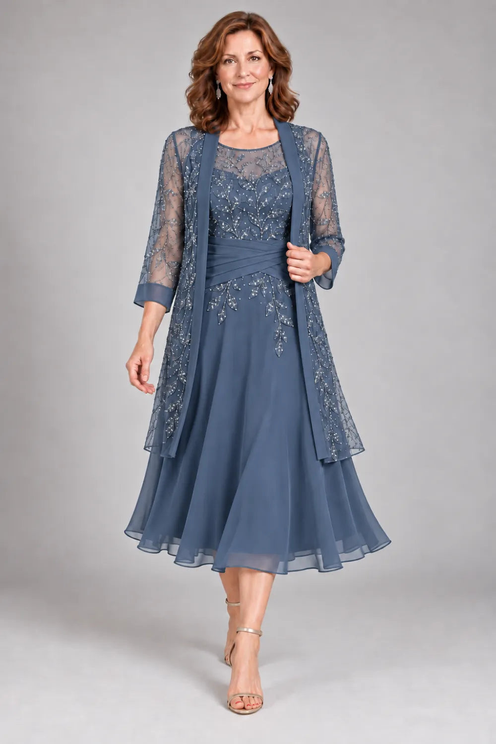 Dusty Blue dress with floral lace extending below the waist, front view.