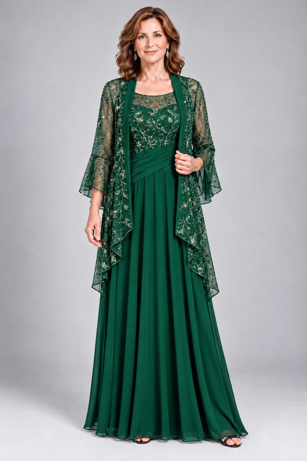 Emerald Green dress with floral decorated bodice and diagonal gathered waist, front view.