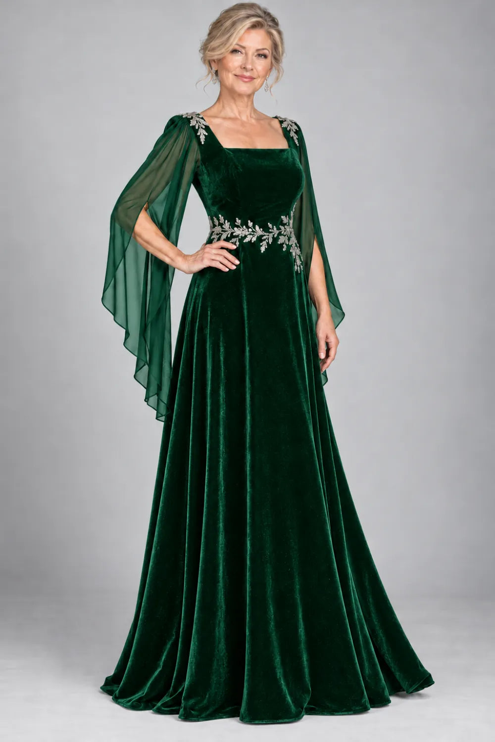 Emerald Green dress with silver-tone leafy waist and shoulder accents, front view.