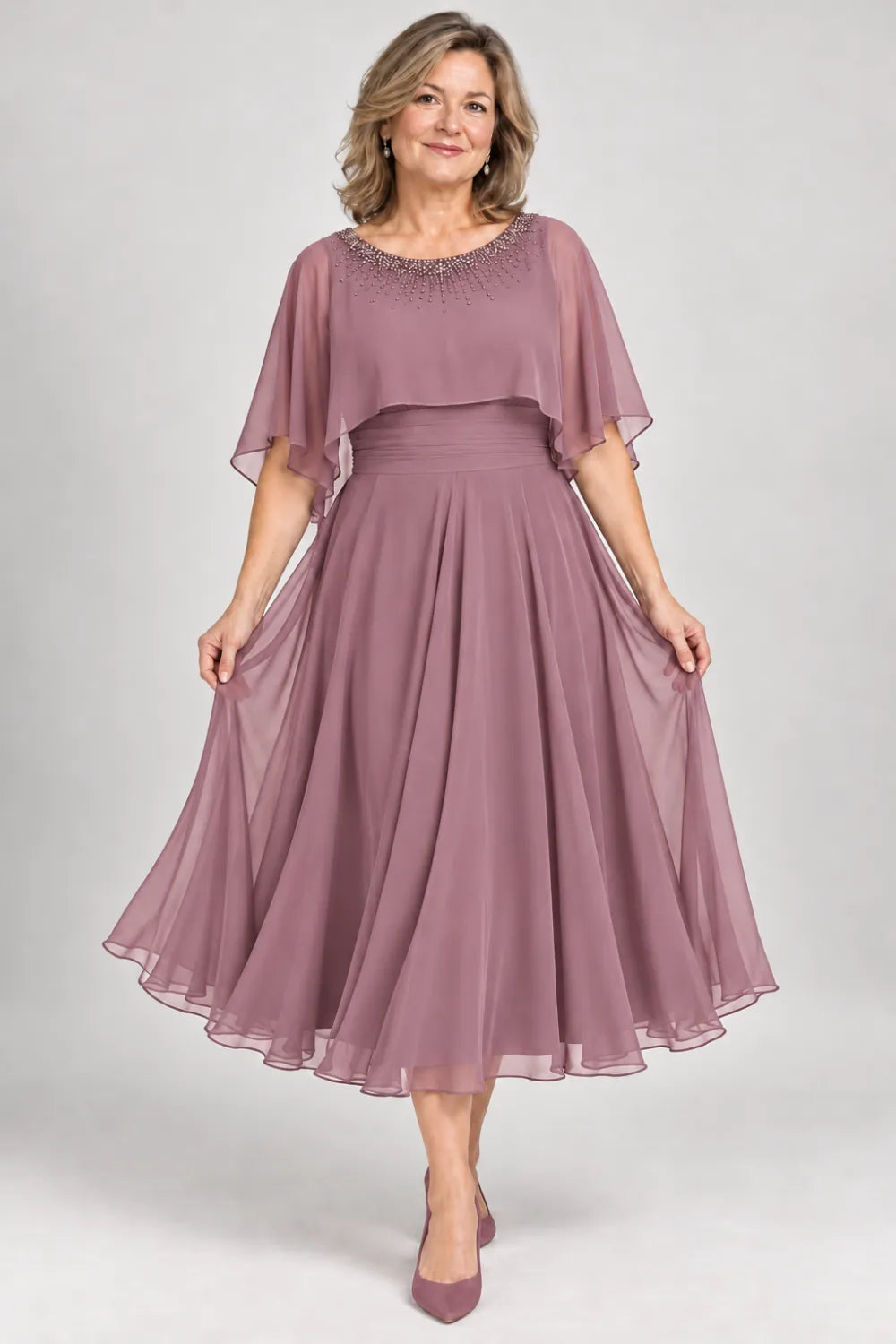 Mauve dress with narrow beaded neckline and defined waist, front view.