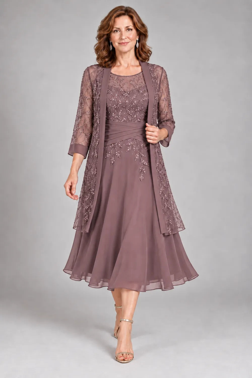 Mauve dress with floral lace extending below the waist, front view.