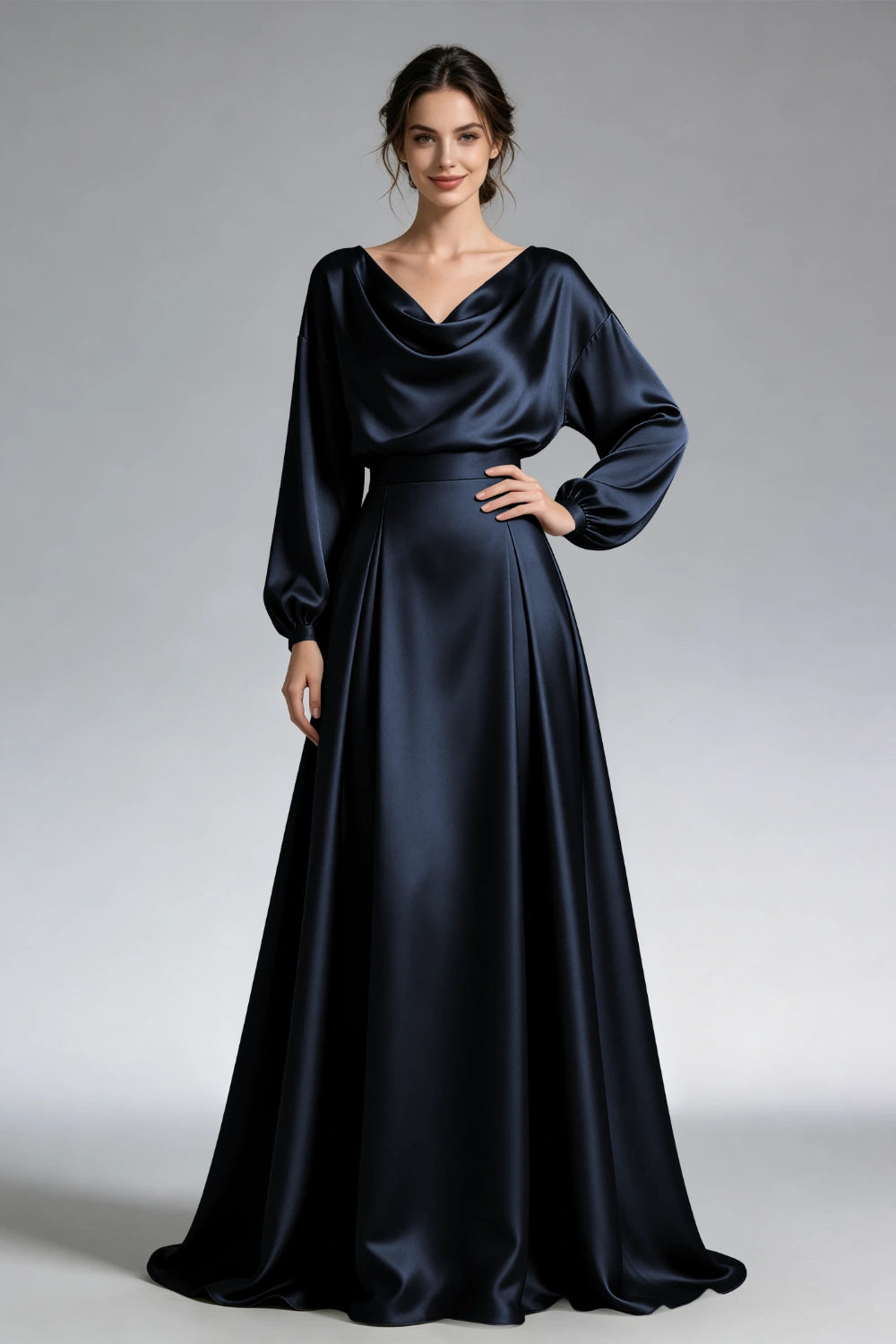 Front view of the navy cowl-neck gown with loose long sleeves and a wide waistband.