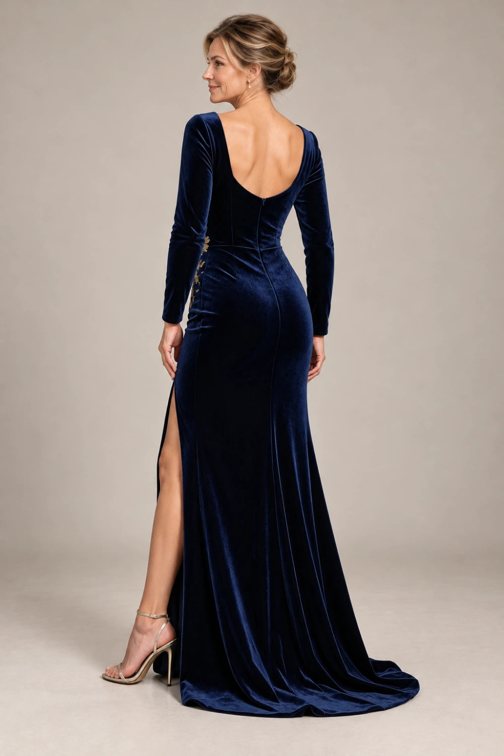 Back view of the navy occasion gown.