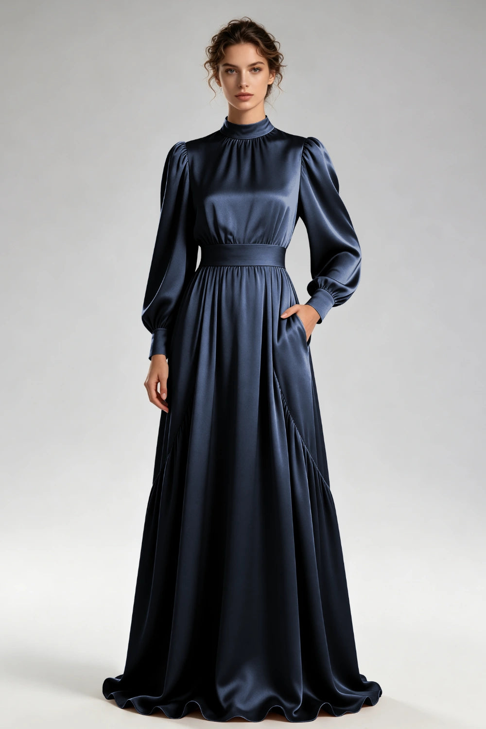 Front view of the navy high-neck gown with bishop sleeves and a wide waistband.