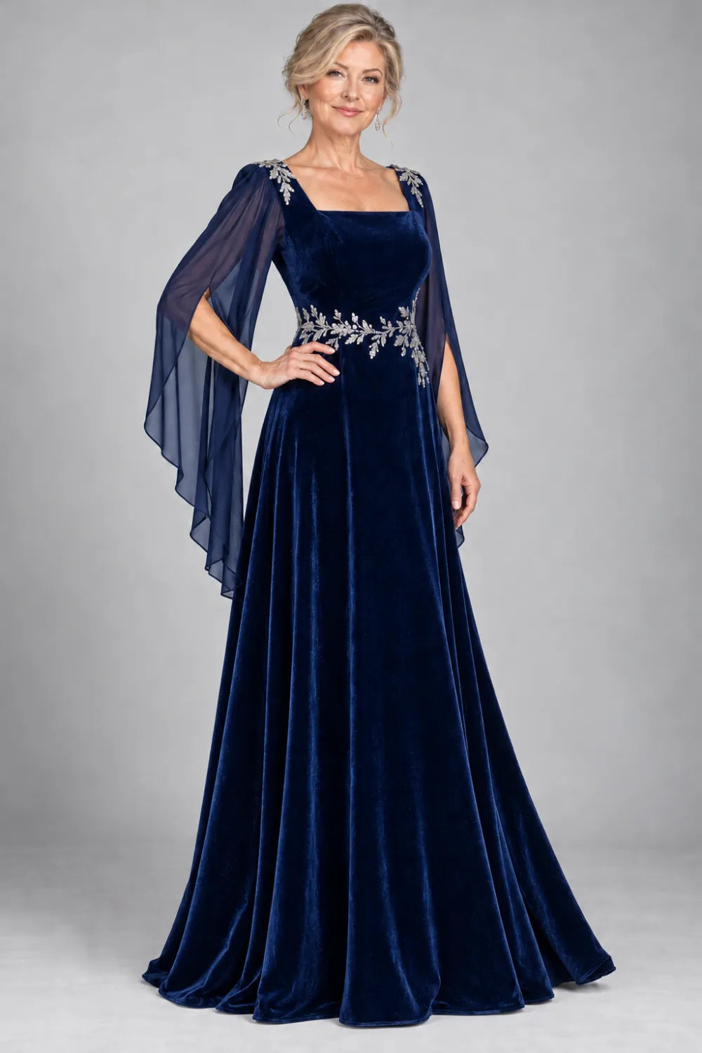 Navy Blue dress with silver-tone leafy waist and shoulder accents, front view.