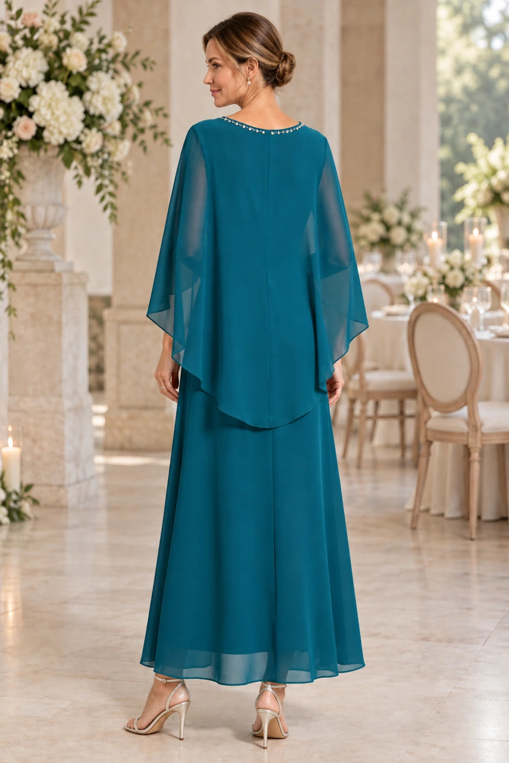 Back view of the peacock cape dress.
