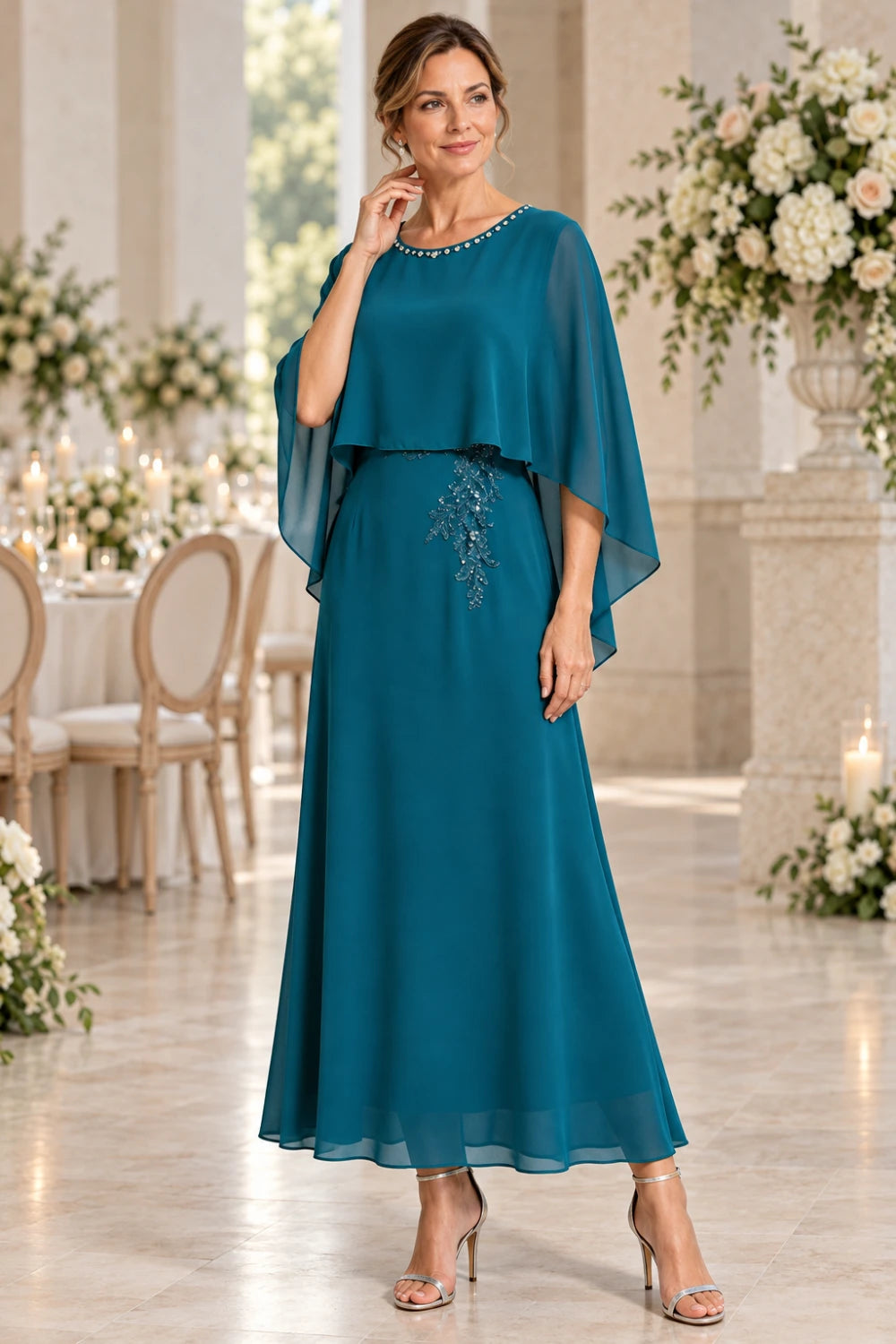 Editorial front view of the peacock cape dress.