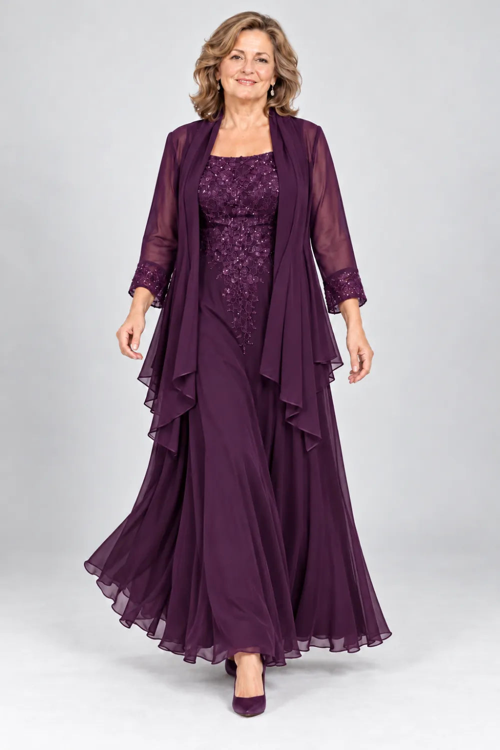 Plum dress with floral bodice and matching decorated cuffs, front view.