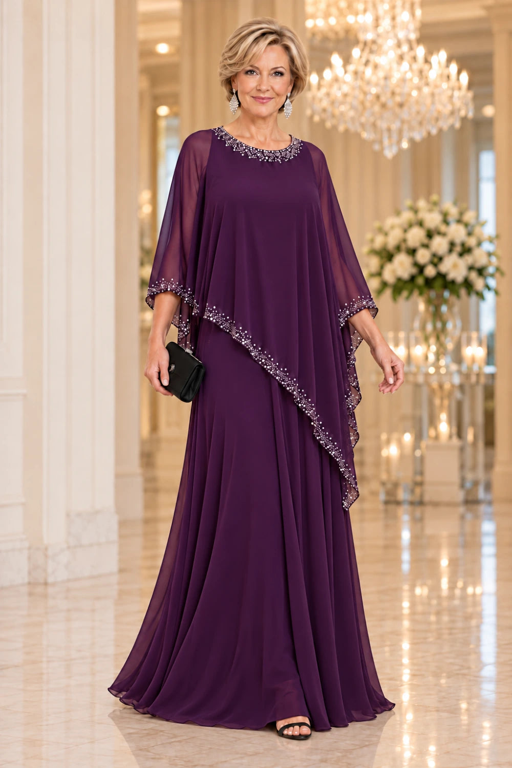 Plum floor-length dress with a diagonal waterfall cape and dotted edging, front view.