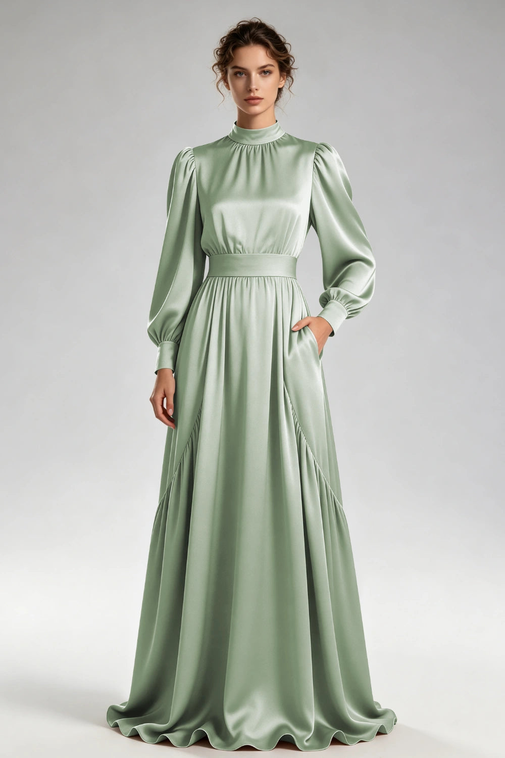 Front view of the sage green high-neck gown with bishop sleeves and a wide waistband.