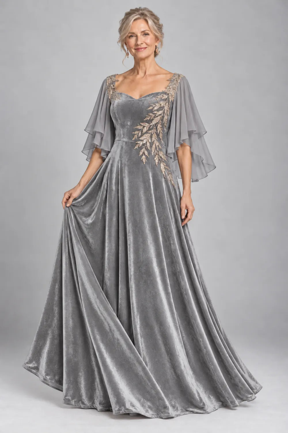 Silver Gray dress with diagonal gold-tone leaf embroidery, front view.