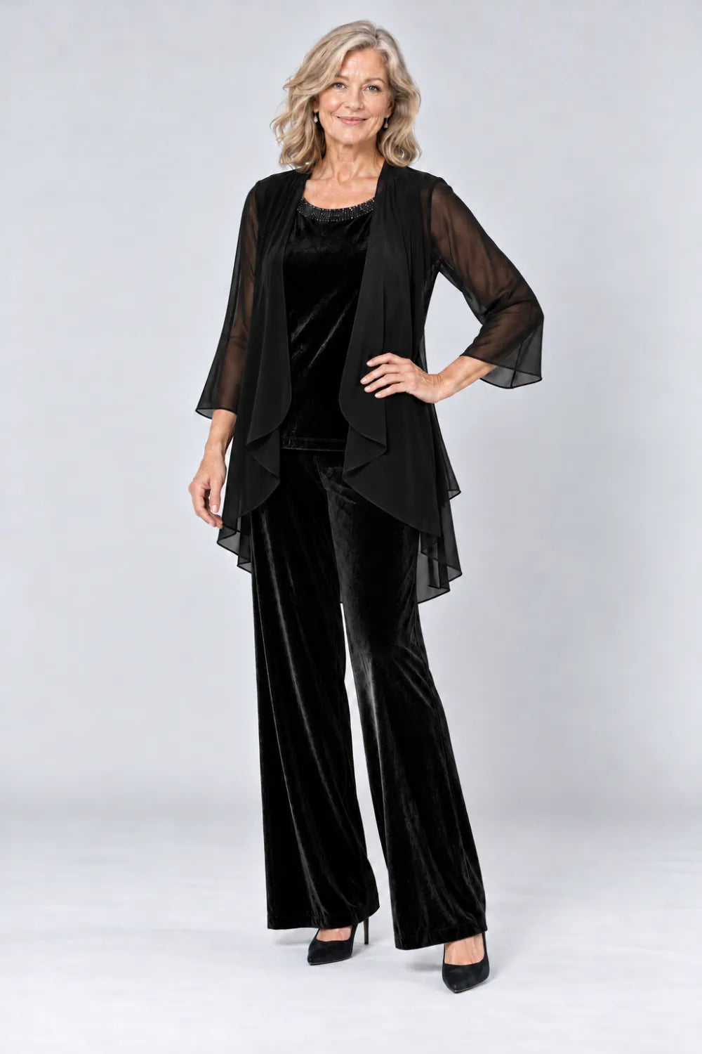 Black pant suit with plain waterfall panels and rounded top neckline, front view.