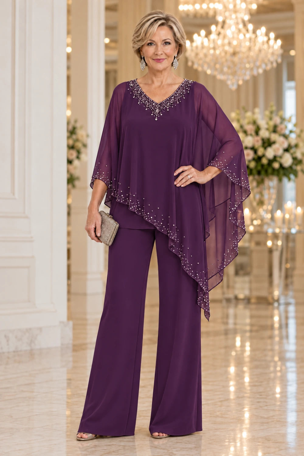 Plum wide-leg pant suit with a pointed waterfall cape and bright V-neck trim, front view.