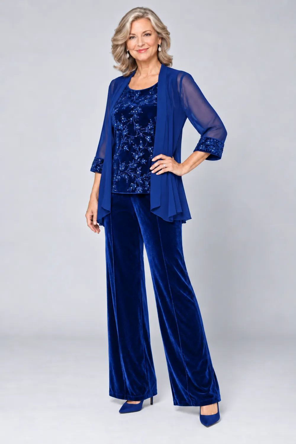 Royal Blue pant suit with tonal floral top and matching cuff panels, front view.