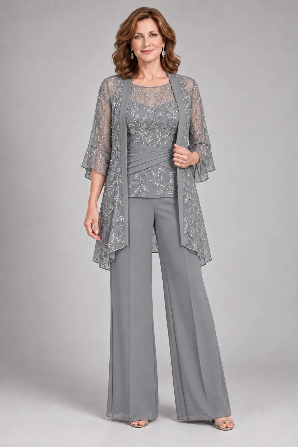 Silver Gray pant suit with floral lace top and diagonal gathered waist, front view.