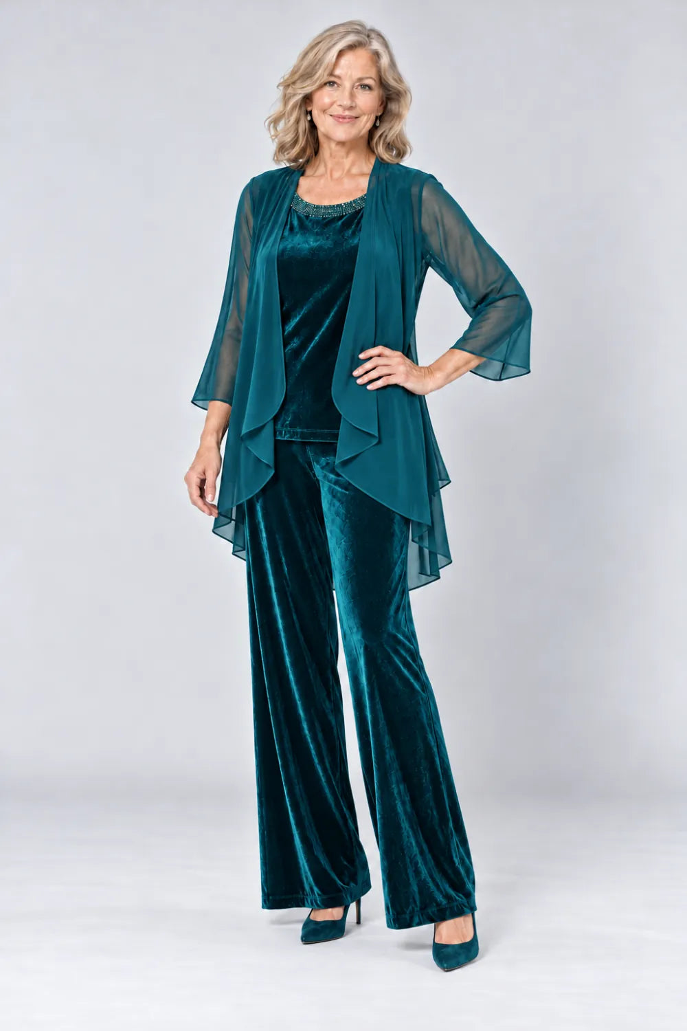 Teal pant suit with plain waterfall panels and rounded top neckline, front view.