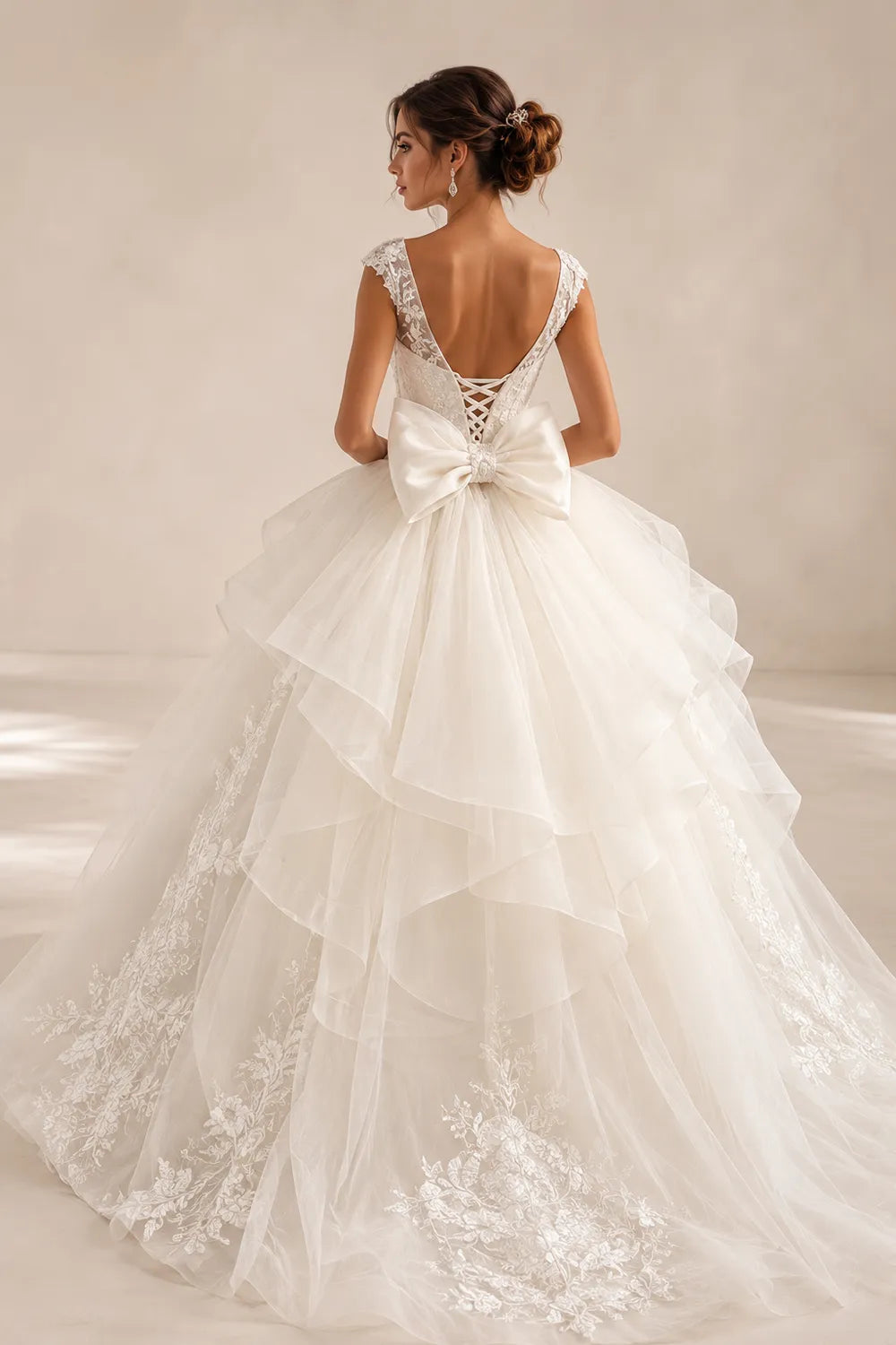 Luxury Embroidered Tiered Ball Gown with Back Bow