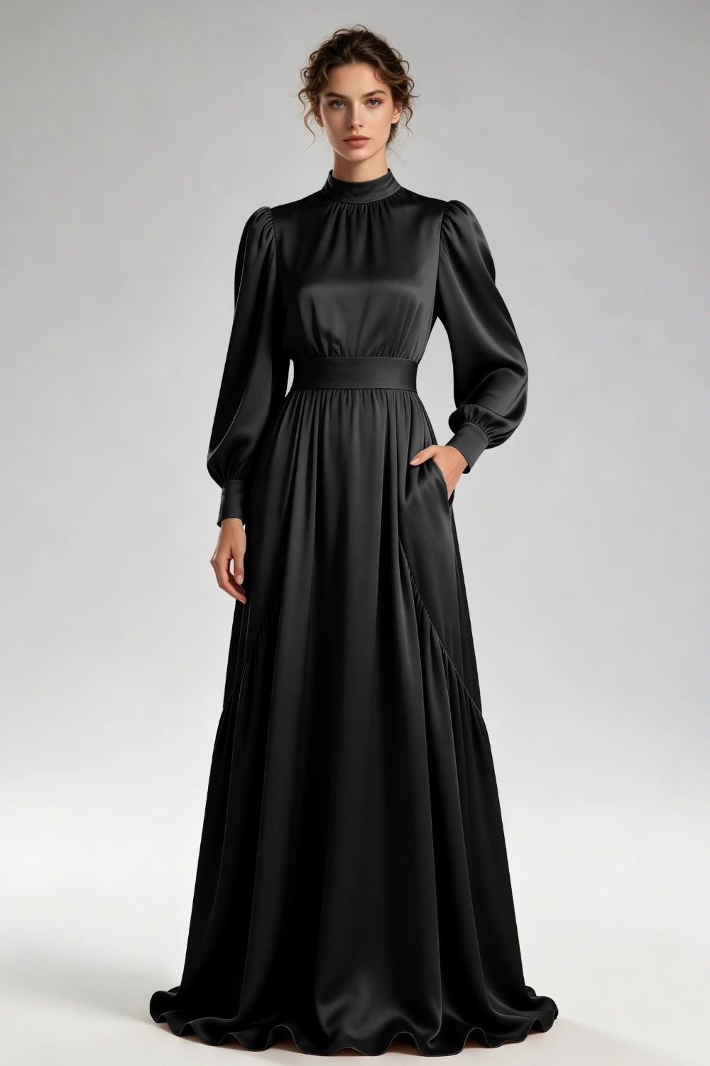 Front view of the black high-neck gown with bishop sleeves and a wide waistband.