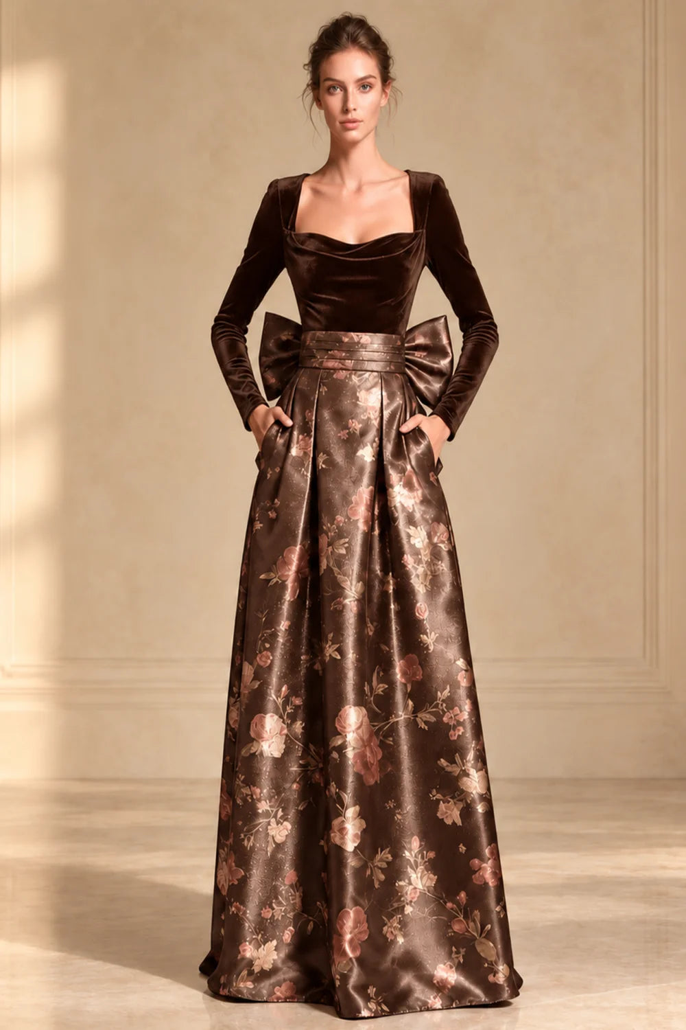 Front view of a brown dress with a dark bodice and full floral skirt.