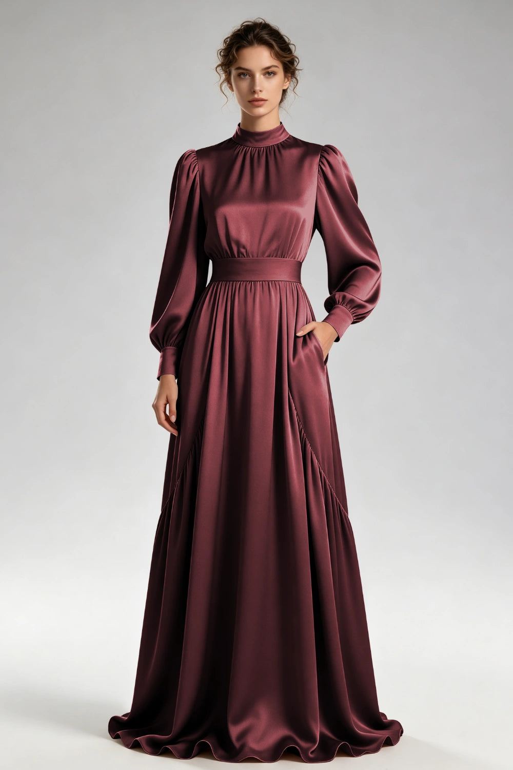 Front view of the burgundy high-neck gown with bishop sleeves and a wide waistband.