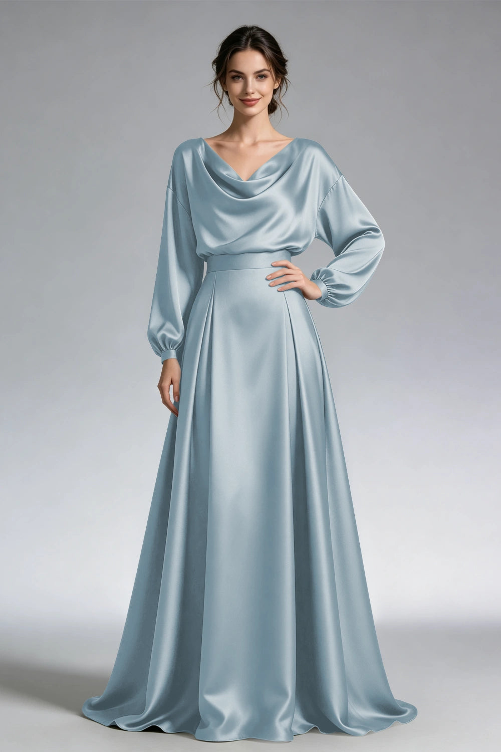 Front view of the dusty blue cowl-neck gown with loose long sleeves and a wide waistband.