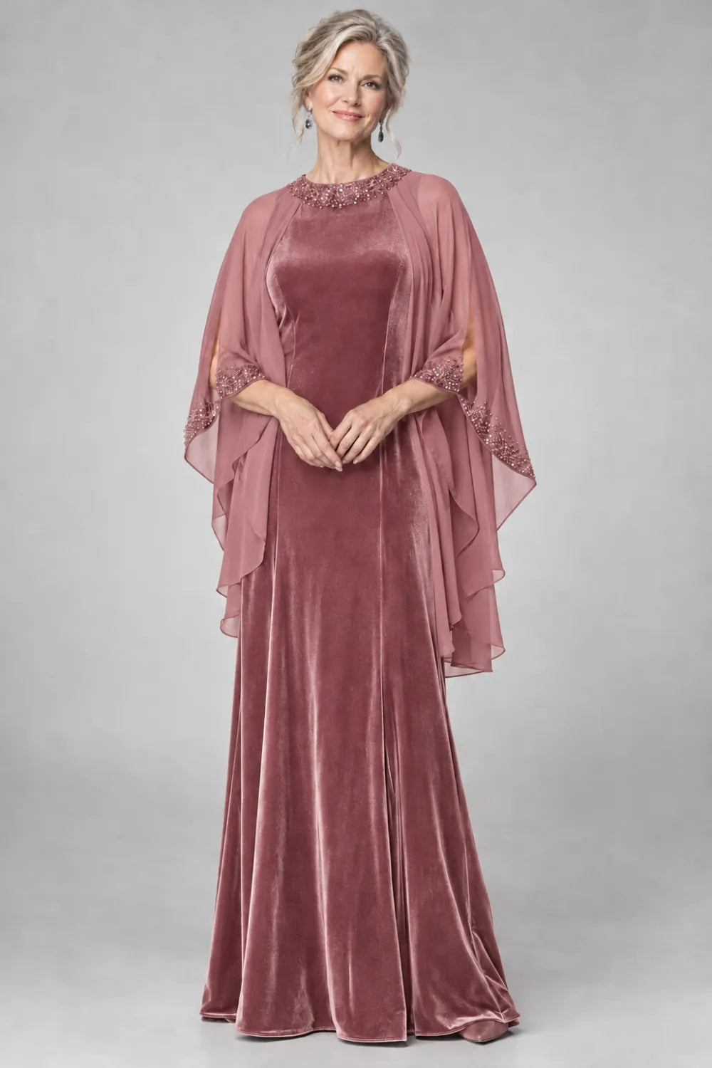 Dusty Rose dress with beaded round neckline and cascading sheer cape, front view.