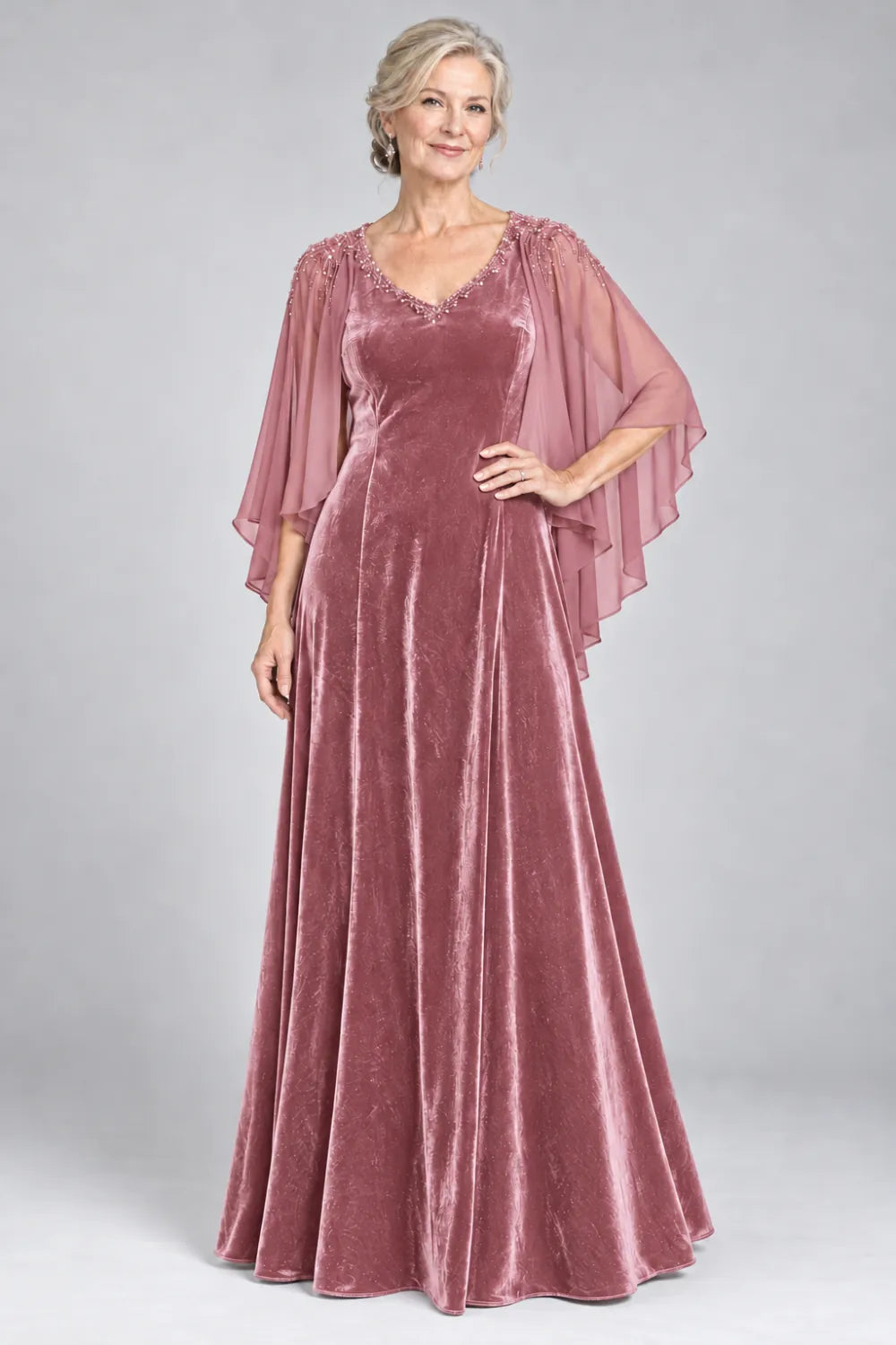Dusty Rose dress with beaded v-neck and layered cascading cape, front view.
