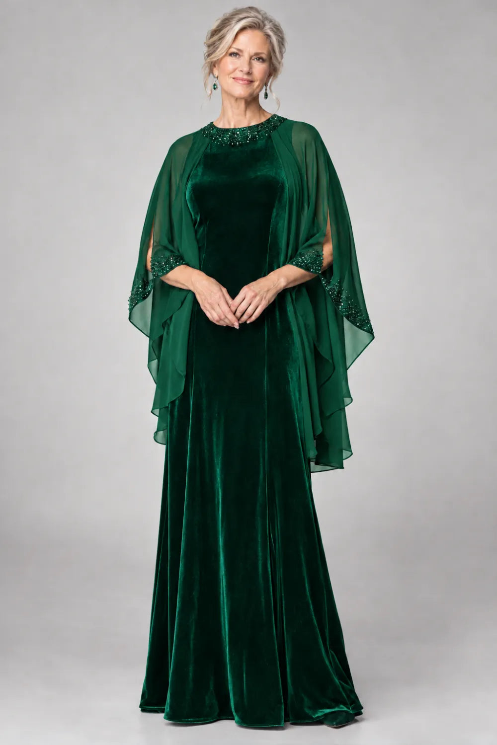 Emerald Green dress with beaded round neckline and cascading sheer cape, front view.
