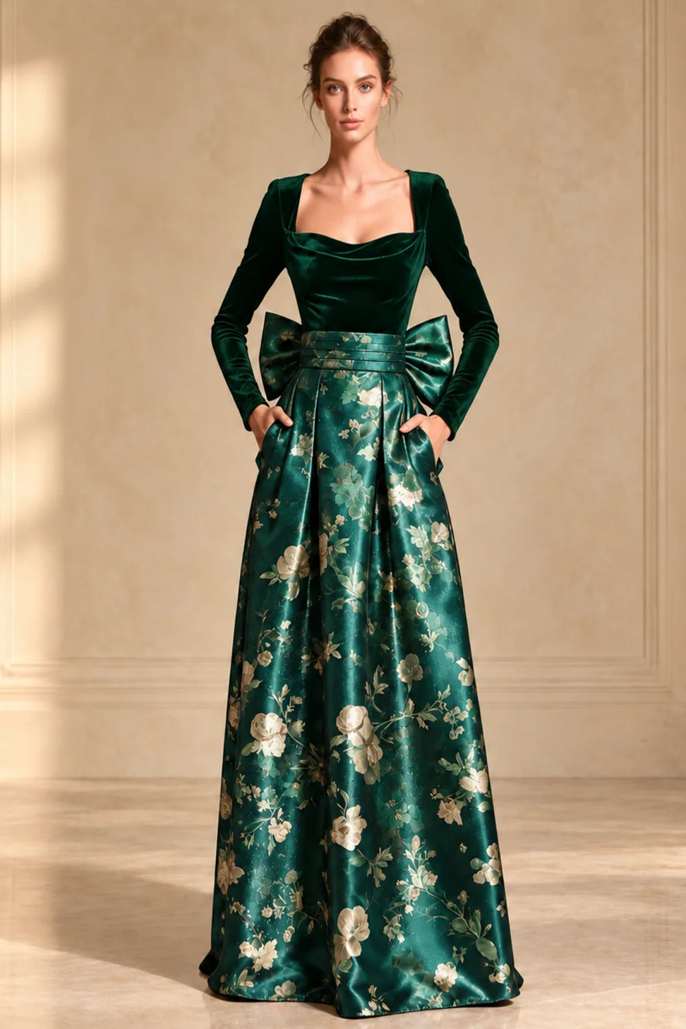 Front view of a emerald green dress with a dark bodice and full floral skirt.