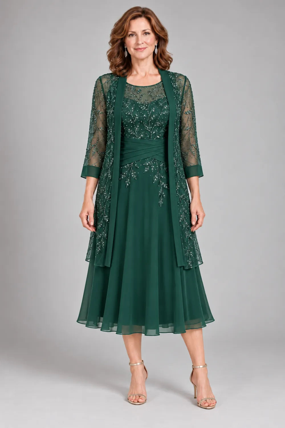 Emerald Green dress with floral lace extending below the waist, front view.