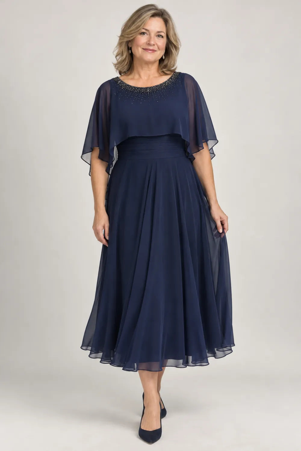 Navy Blue dress with narrow beaded neckline and defined waist, front view.