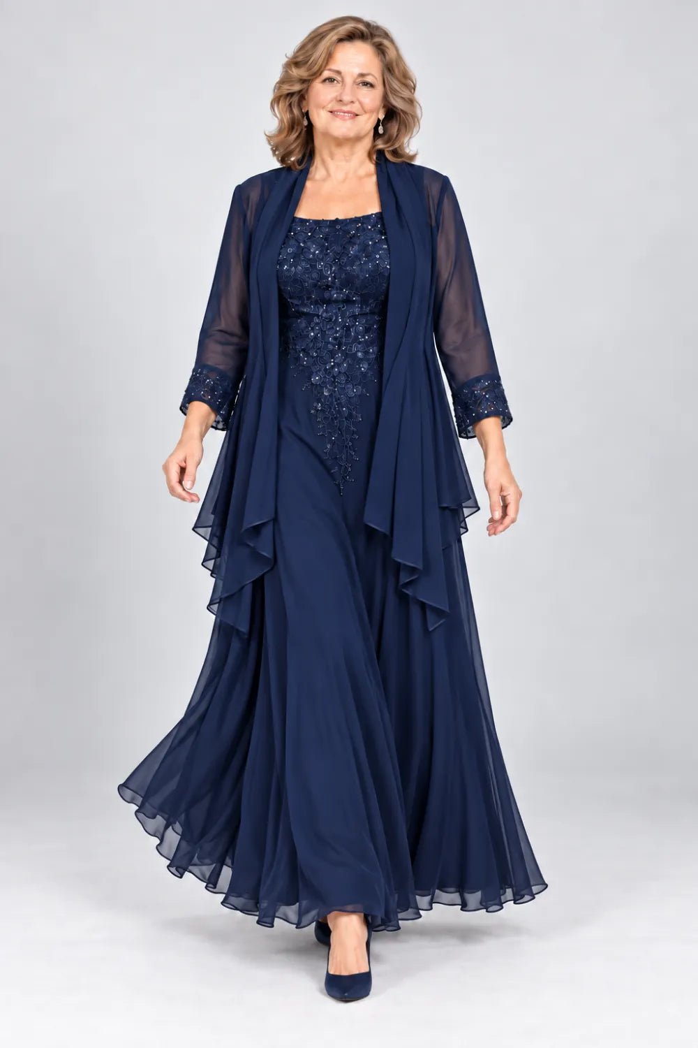 Navy Blue dress with floral bodice and matching decorated cuffs, front view.