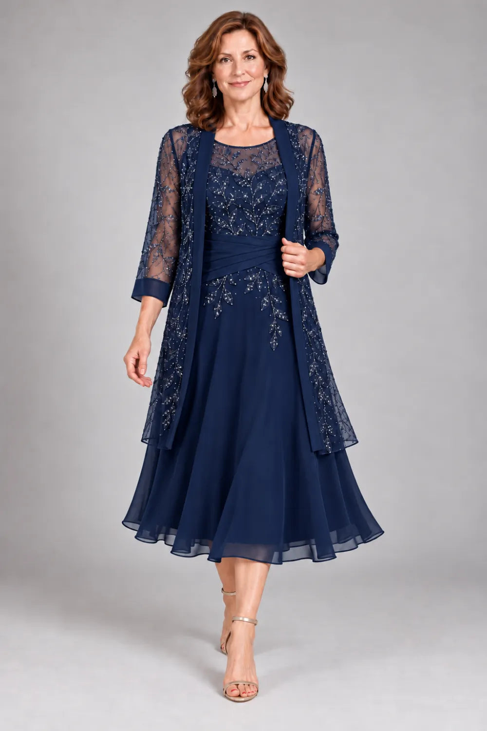Navy Blue dress with floral lace extending below the waist, front view.
