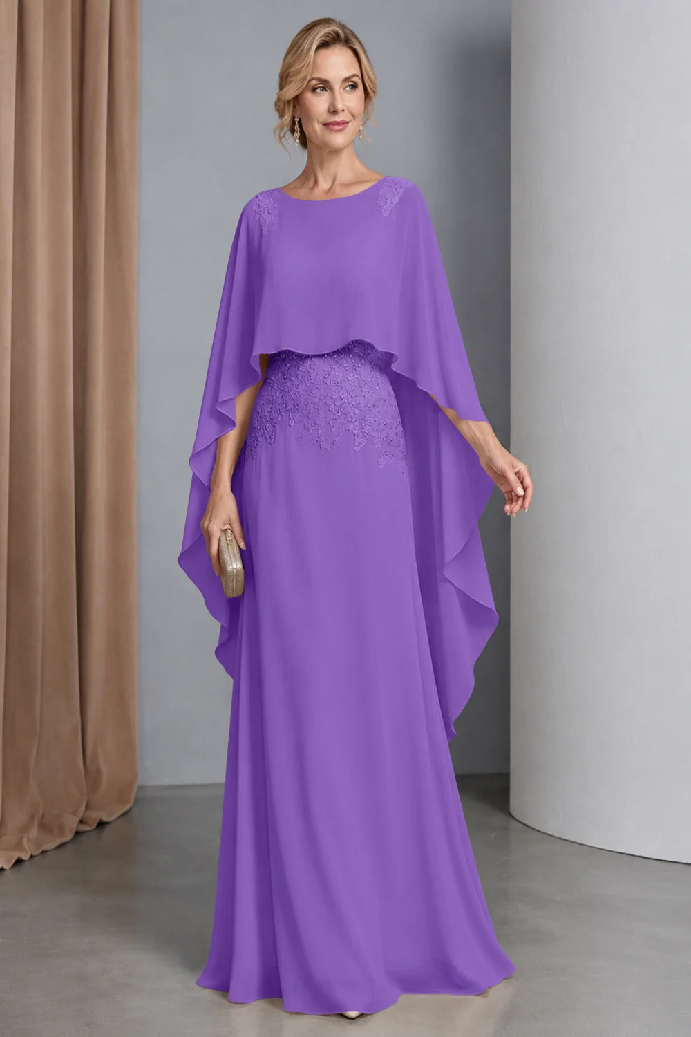 Front view of a purple dress with a curved cape front and embellished waist.