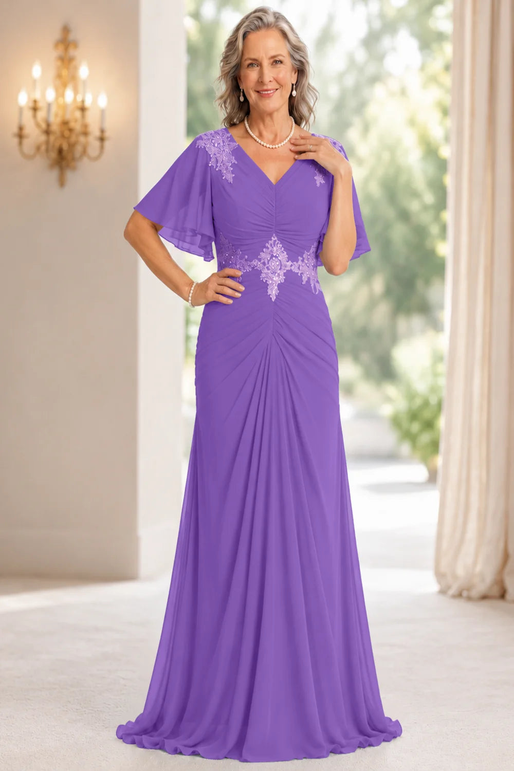 Front view of a purple dress with flutter sleeves and a ruched front.
