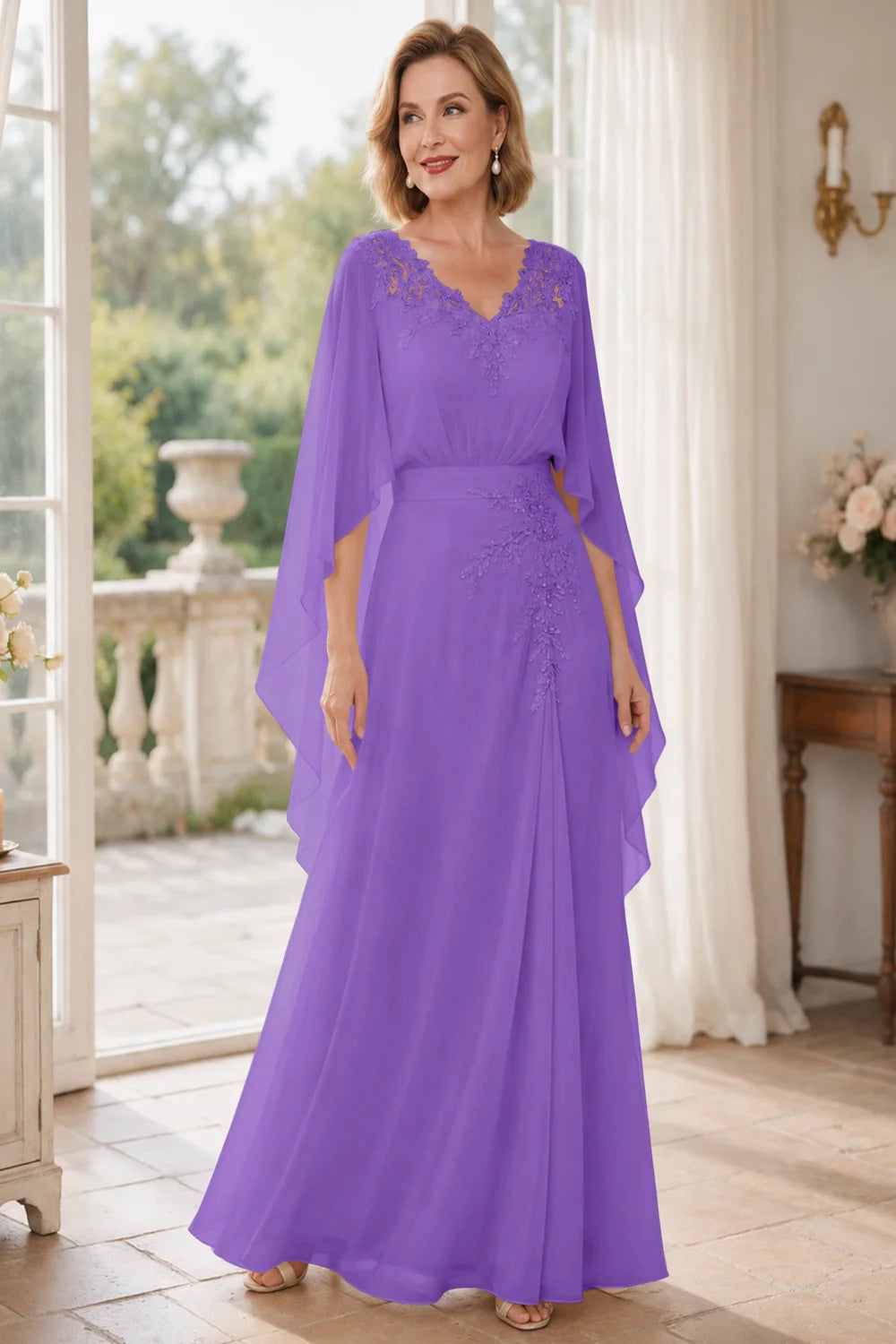 Front view of a purple dress with a lace V neckline and open cape panels.