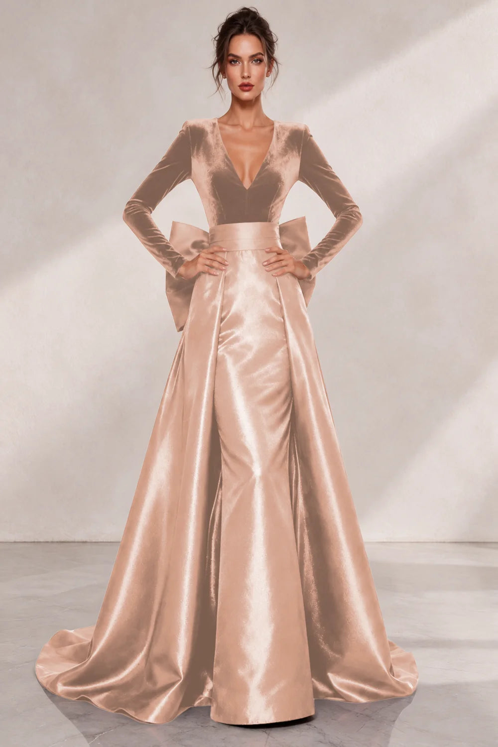 Front view of a rose gold dress with a V neckline and a lustrous full skirt.