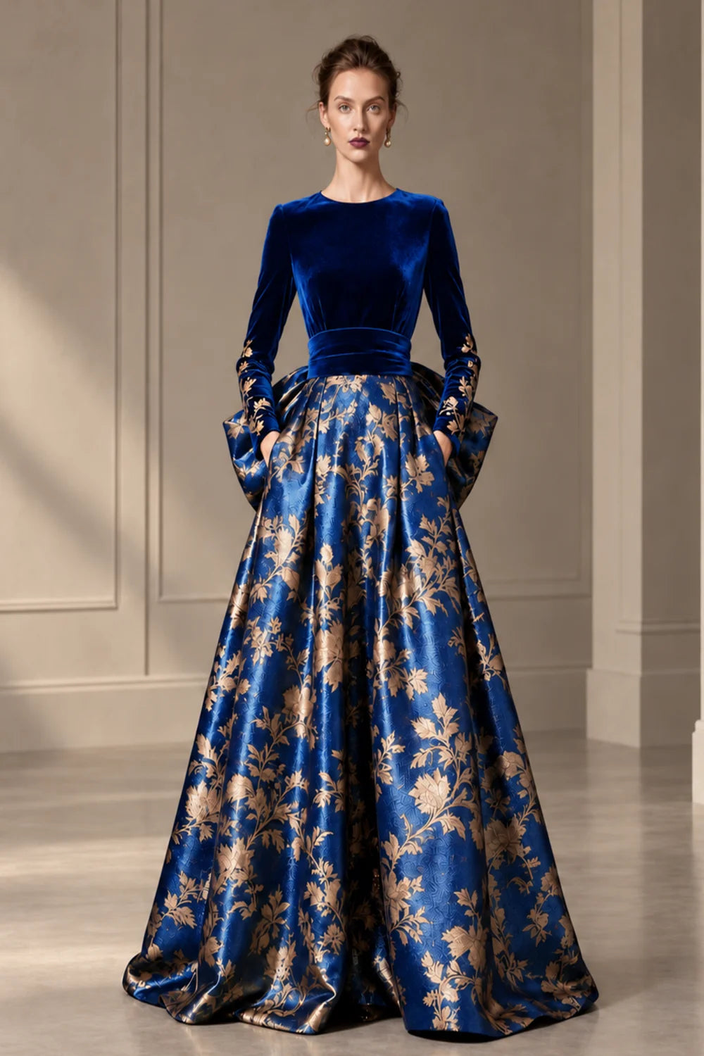 Front view of a royal blue dress with a dark bodice and a full floral skirt.