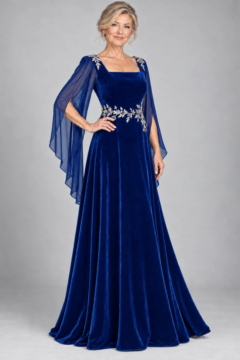 Royal Blue dress with silver-tone leafy waist and shoulder accents, front view.
