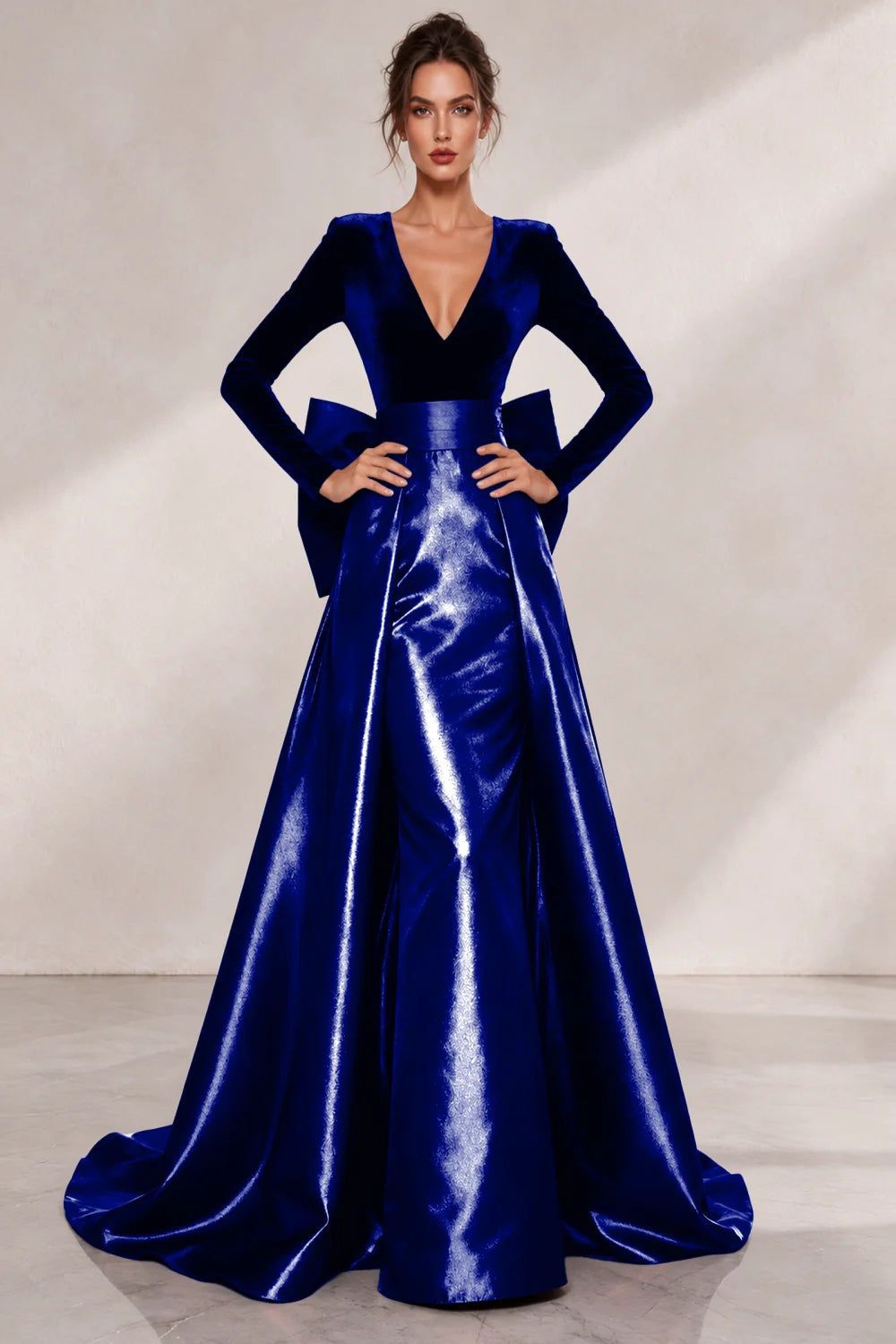 Front view of a royal blue dress with a V neckline and a lustrous full skirt.