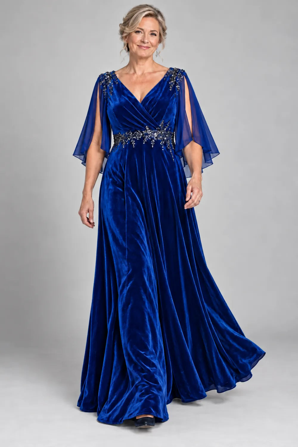 Royal Blue dress with crossover bodice and decorated waist, front view.