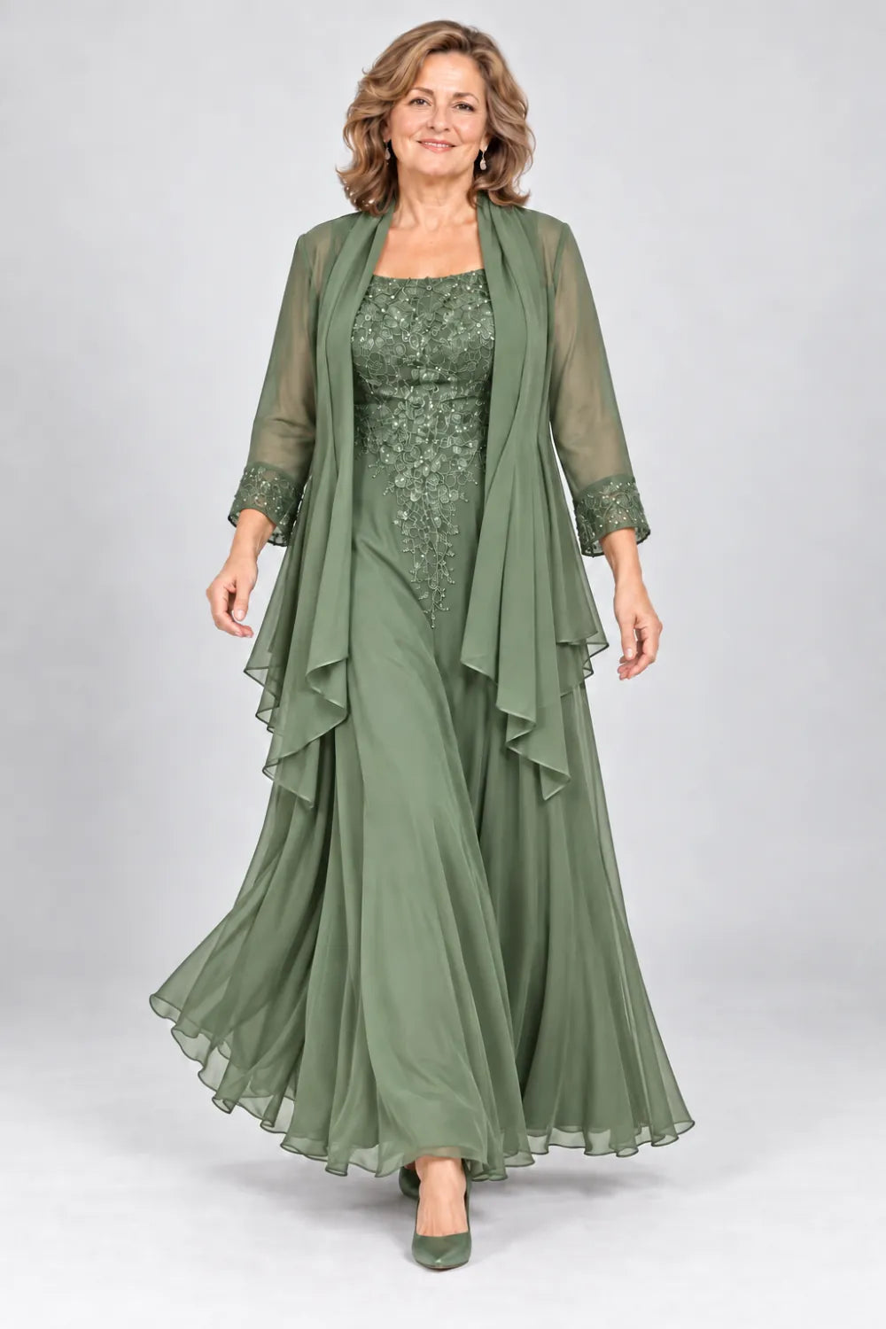 Sage Green dress with floral bodice and matching decorated cuffs, front view.