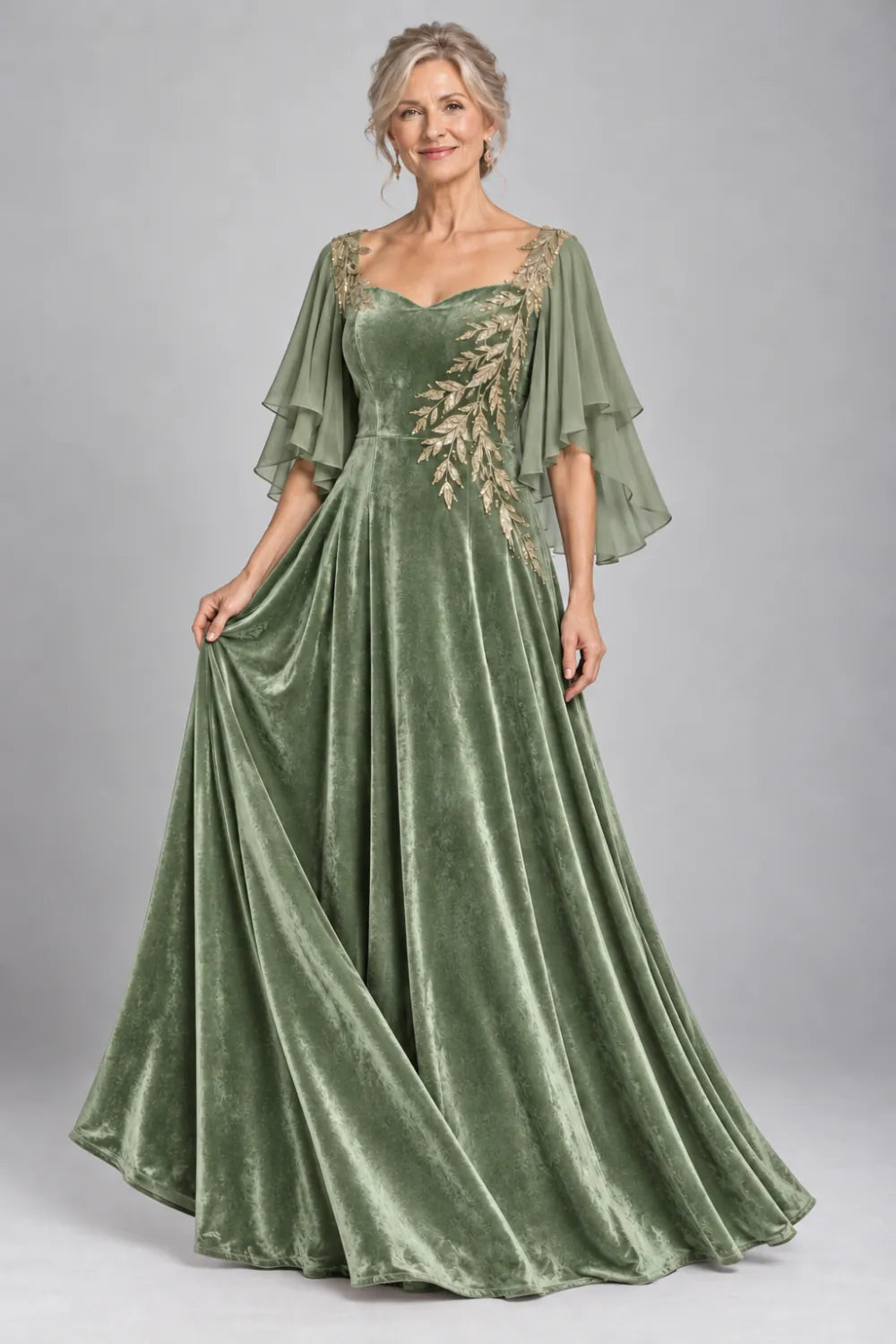 Sage Green dress with diagonal gold-tone leaf embroidery, front view.