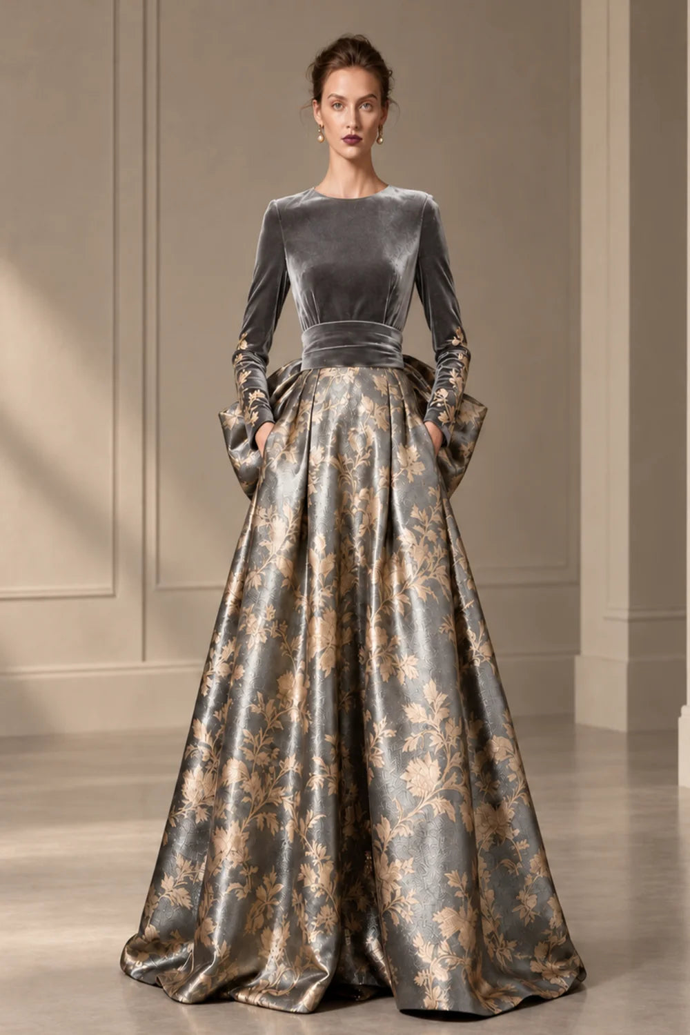 Front view of a silver gray dress with a dark bodice and a full floral skirt.