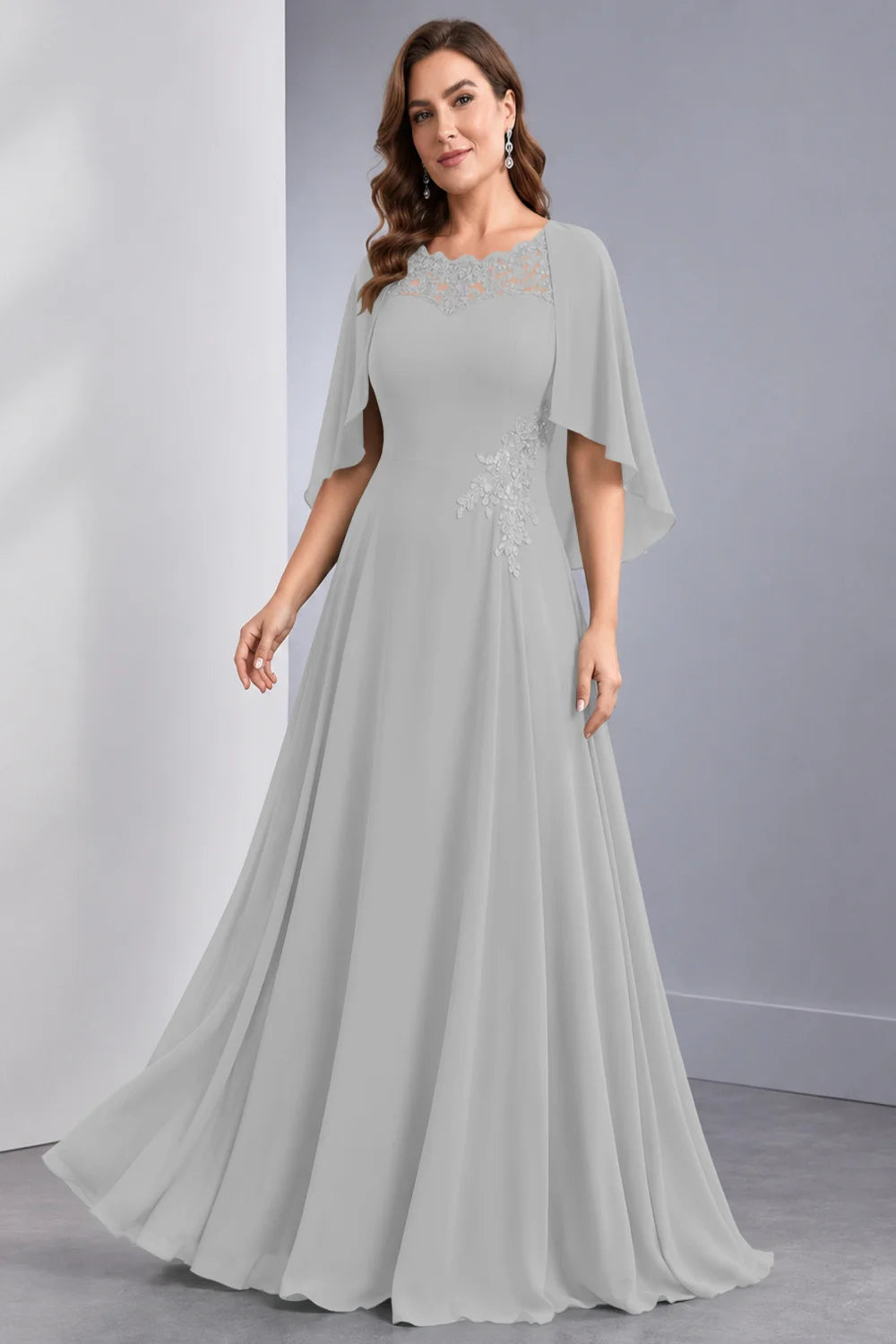 Front view of a silver gray dress with draped sleeve panels and a lace neckline.