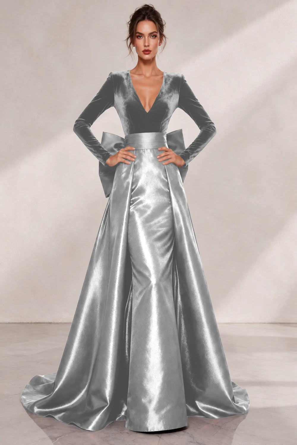 Front view of a silver gray dress with a V neckline and a lustrous full skirt.